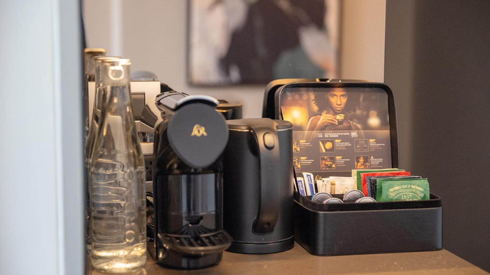 Chatrium Grand Bangkok Exteriér fotografie A Nespresso coffee machine